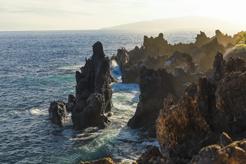 a large body of water surrounded by rocks