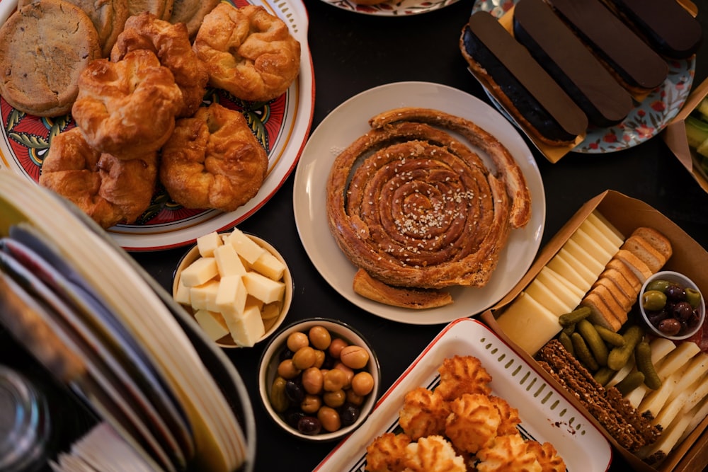 a table topped with lots of different types of food