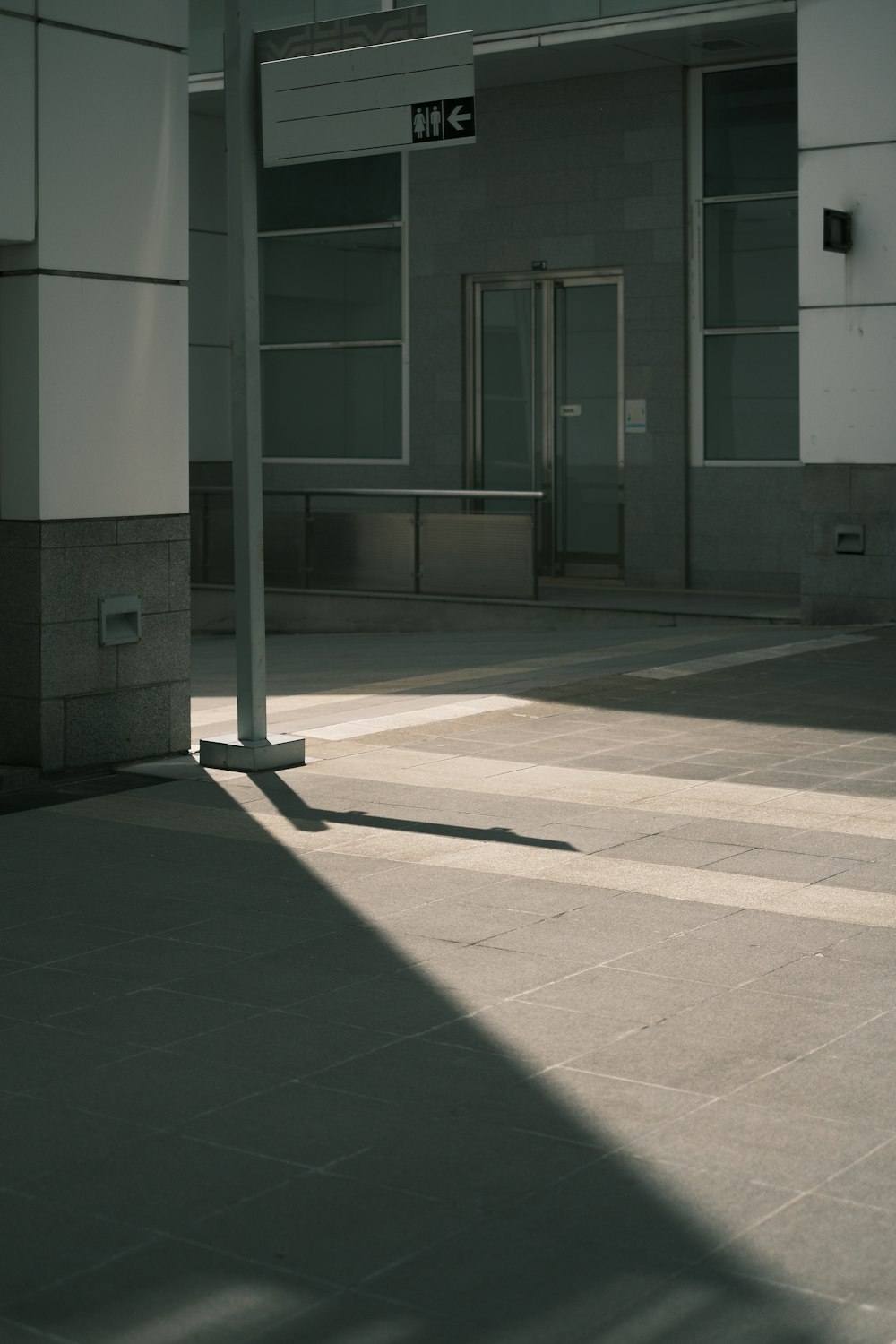 a person riding a skateboard on a city street