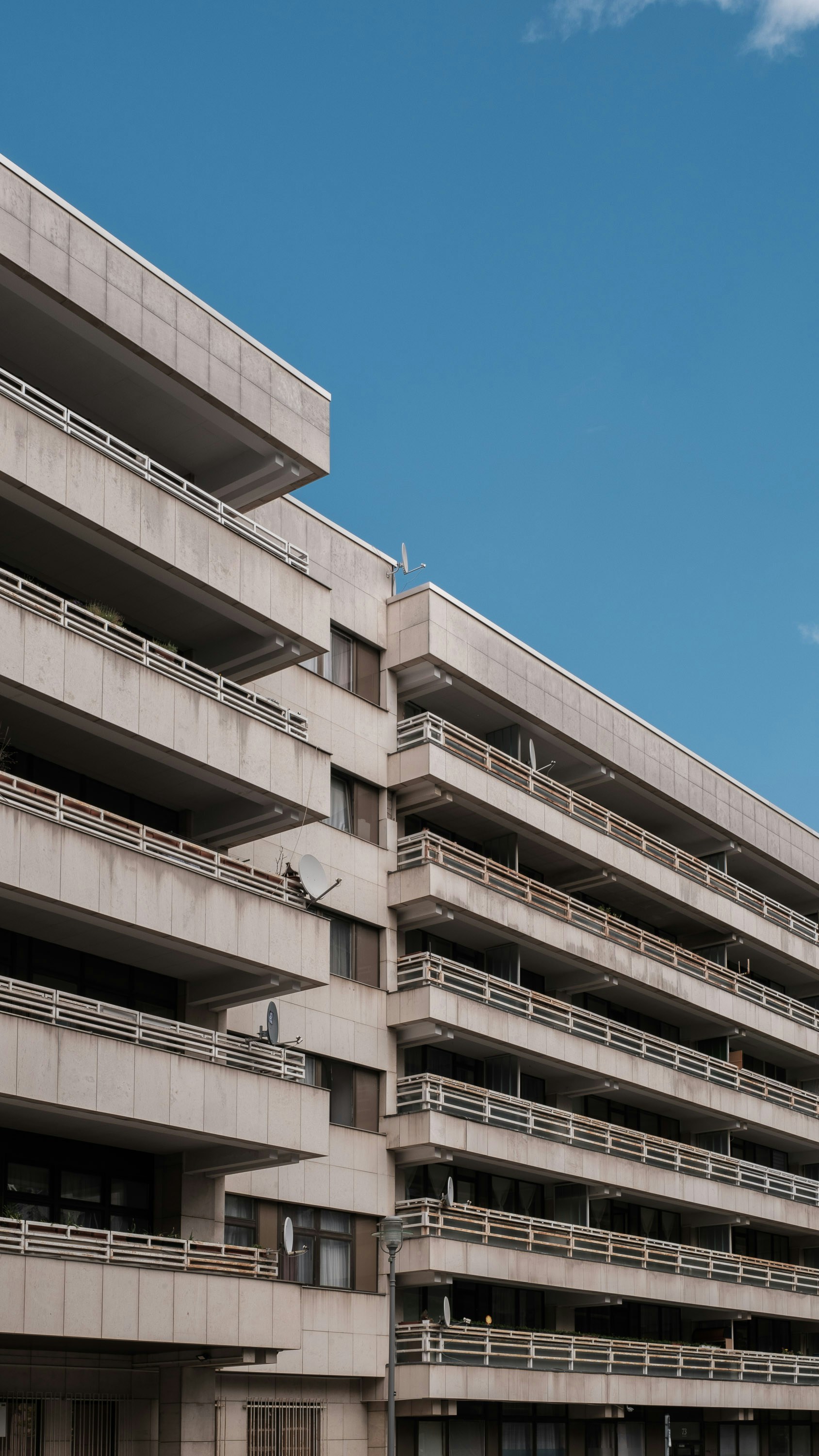a tall building with balconies and balconies on it