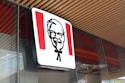 a sign with a picture of a man on it