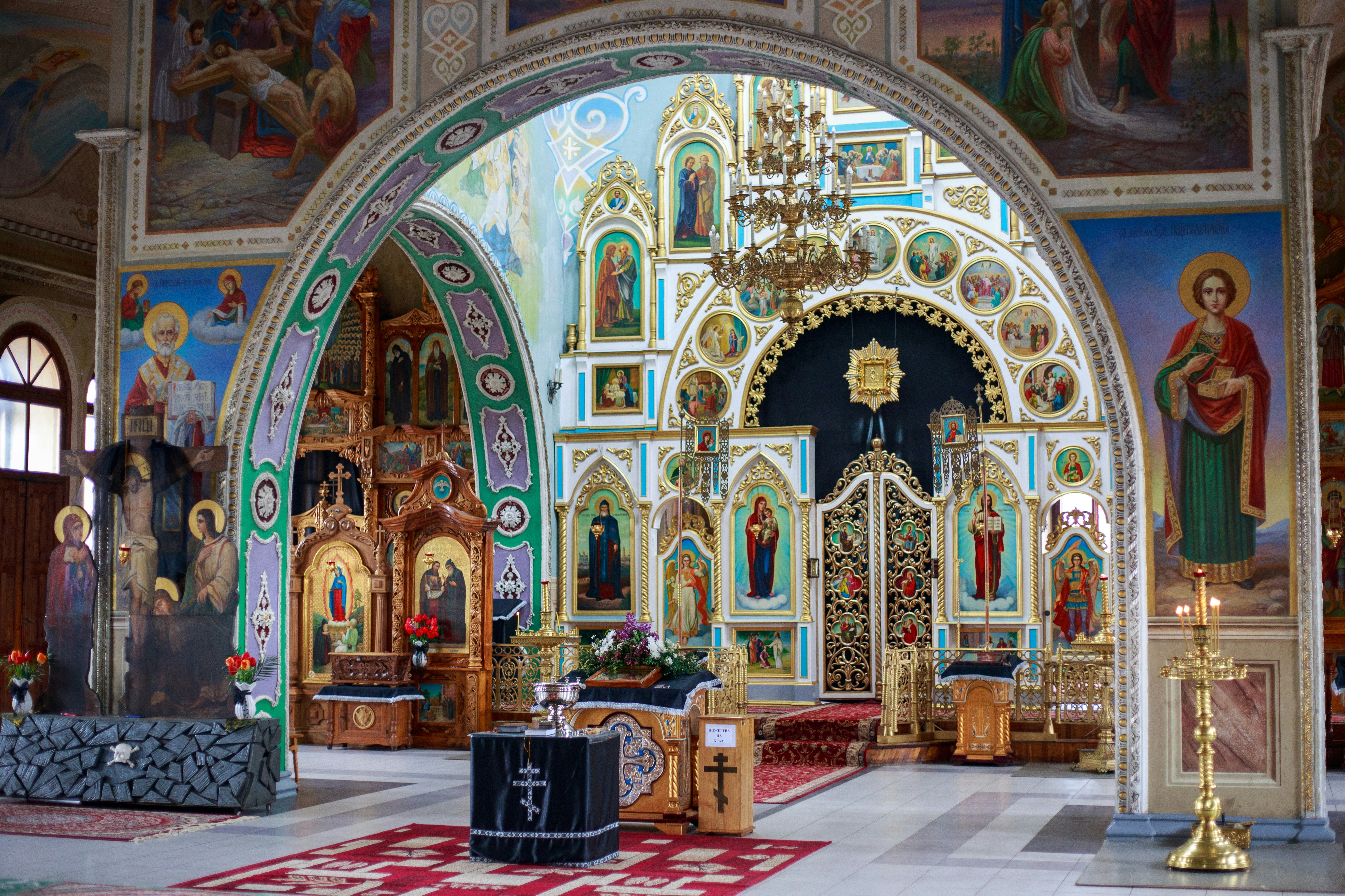 the interior of a church with a large alter