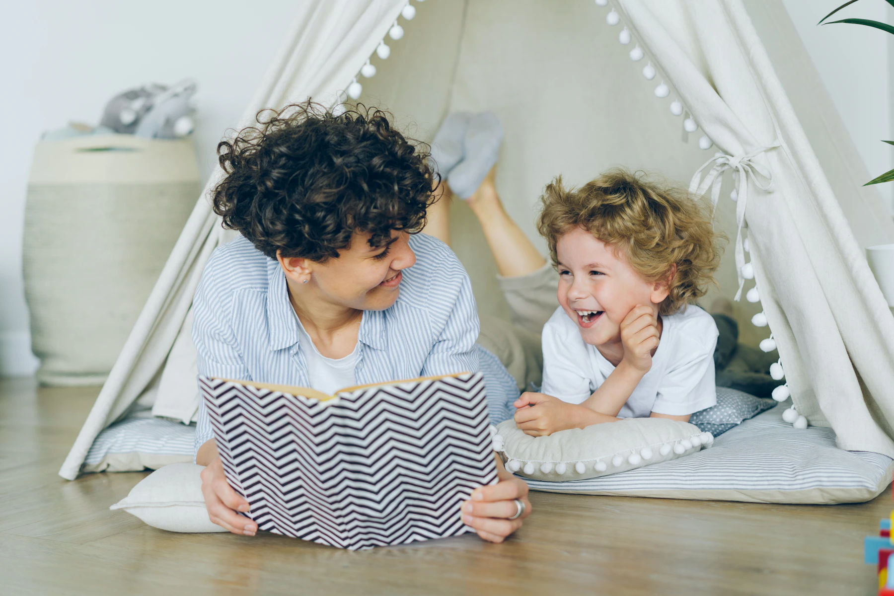 Helper reading to a child