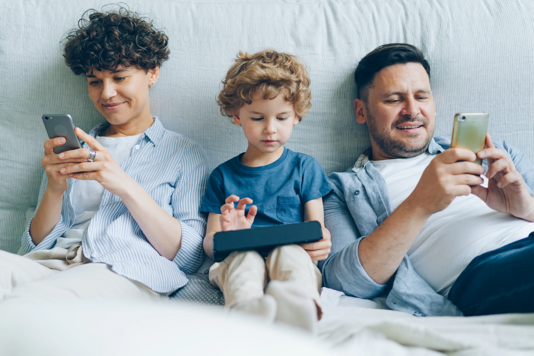 Family using connected devices together at home