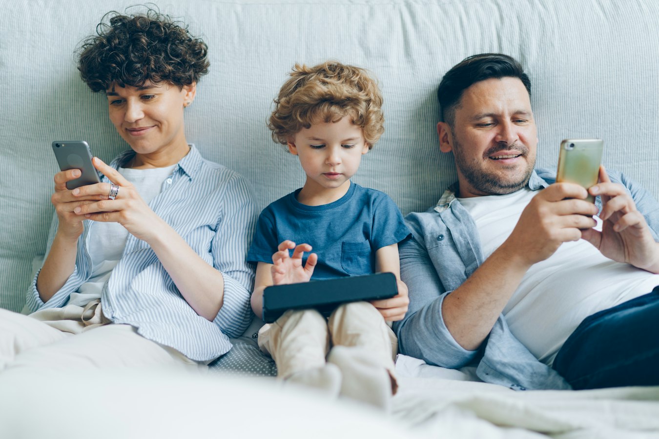 Who's Raising Cayman's Kids? The Car, the Helper, the Screen and Now the Chatbot