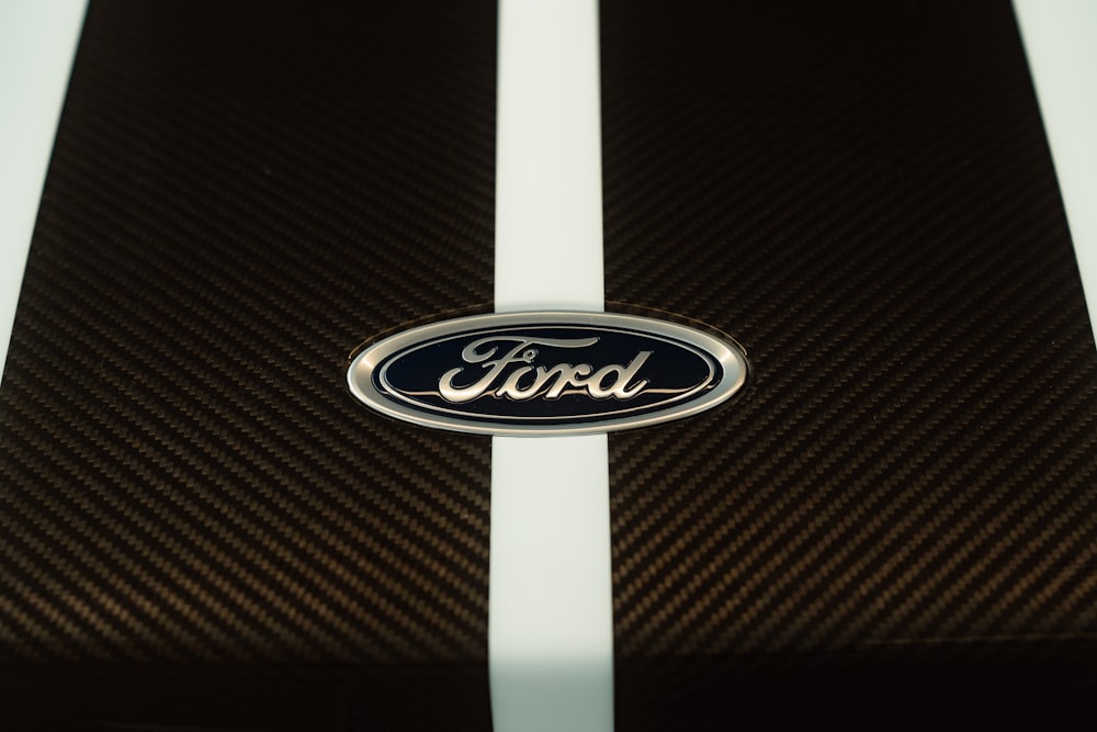 a close up of a ford emblem on a car