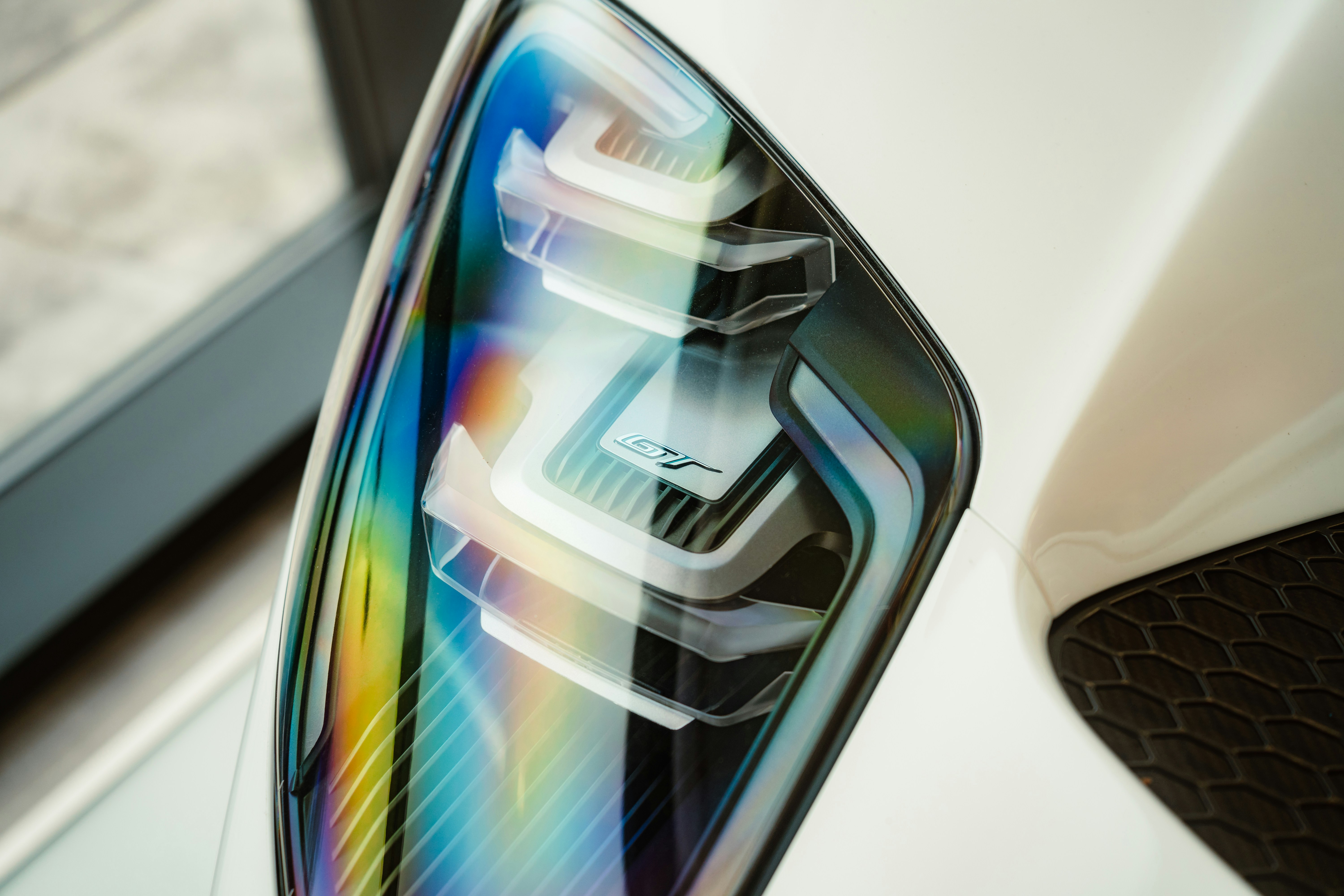 a close up of a car's rear view mirror