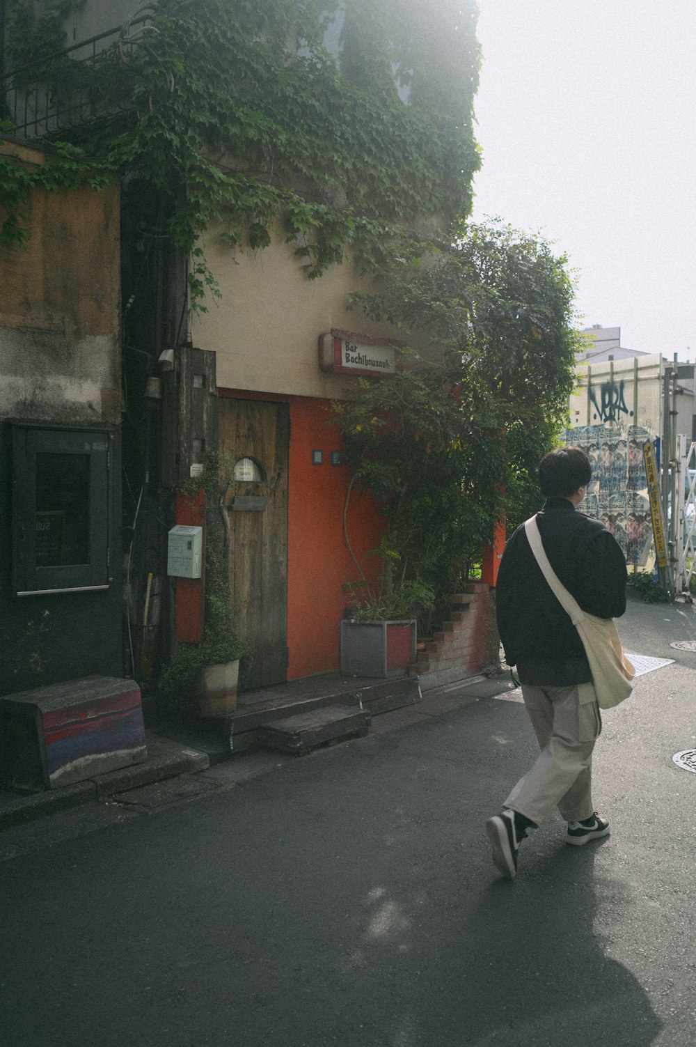 a man riding a skateboard down a street