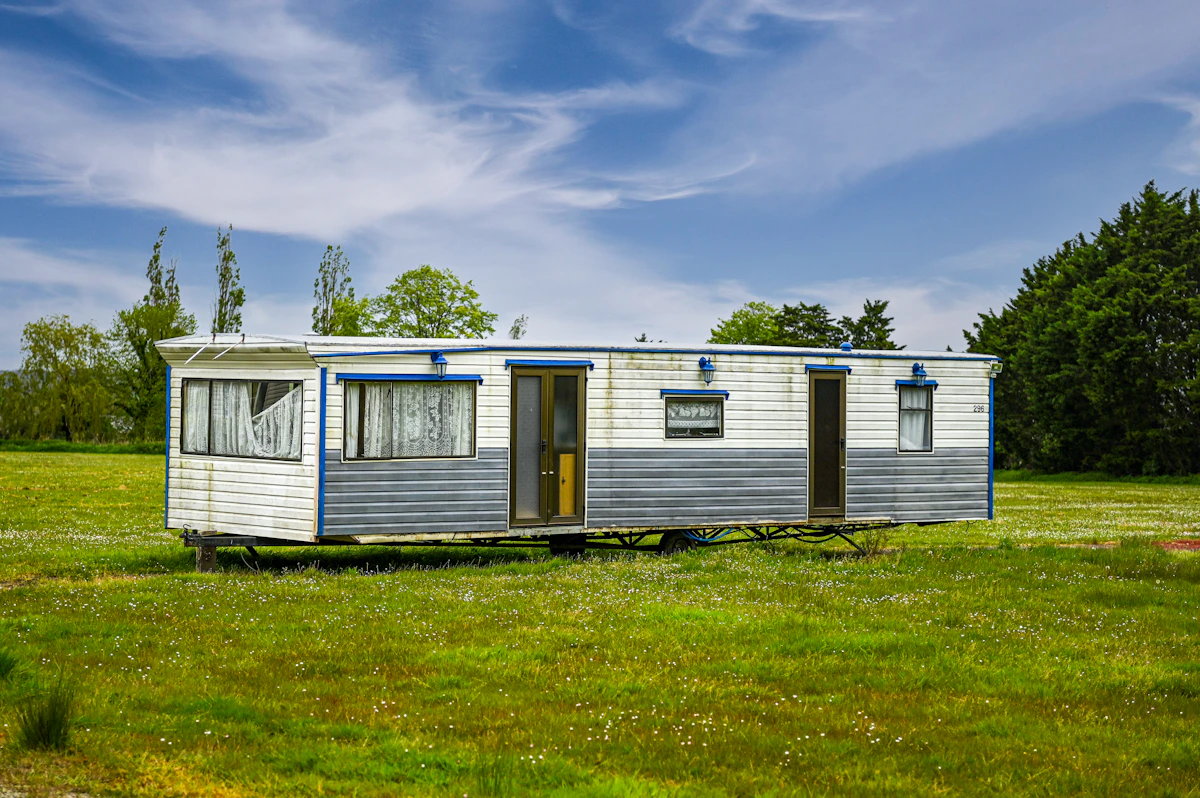 An older manufactured home on its own land parcel