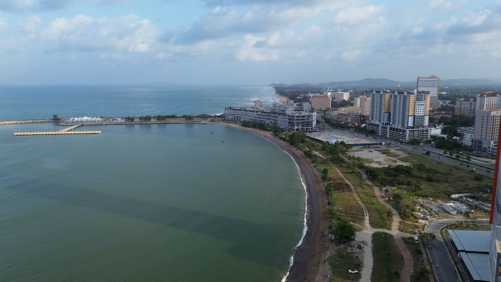 a large body of water next to a city