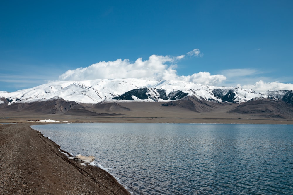 a large body of water surrounded by mountains