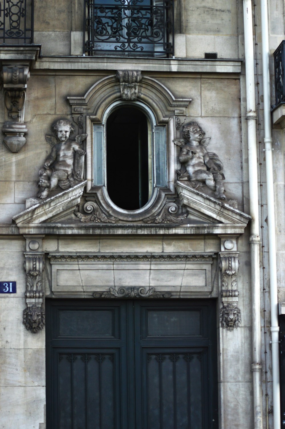 a building with two doors and a window