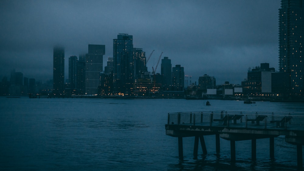 a view of a city at night from the water