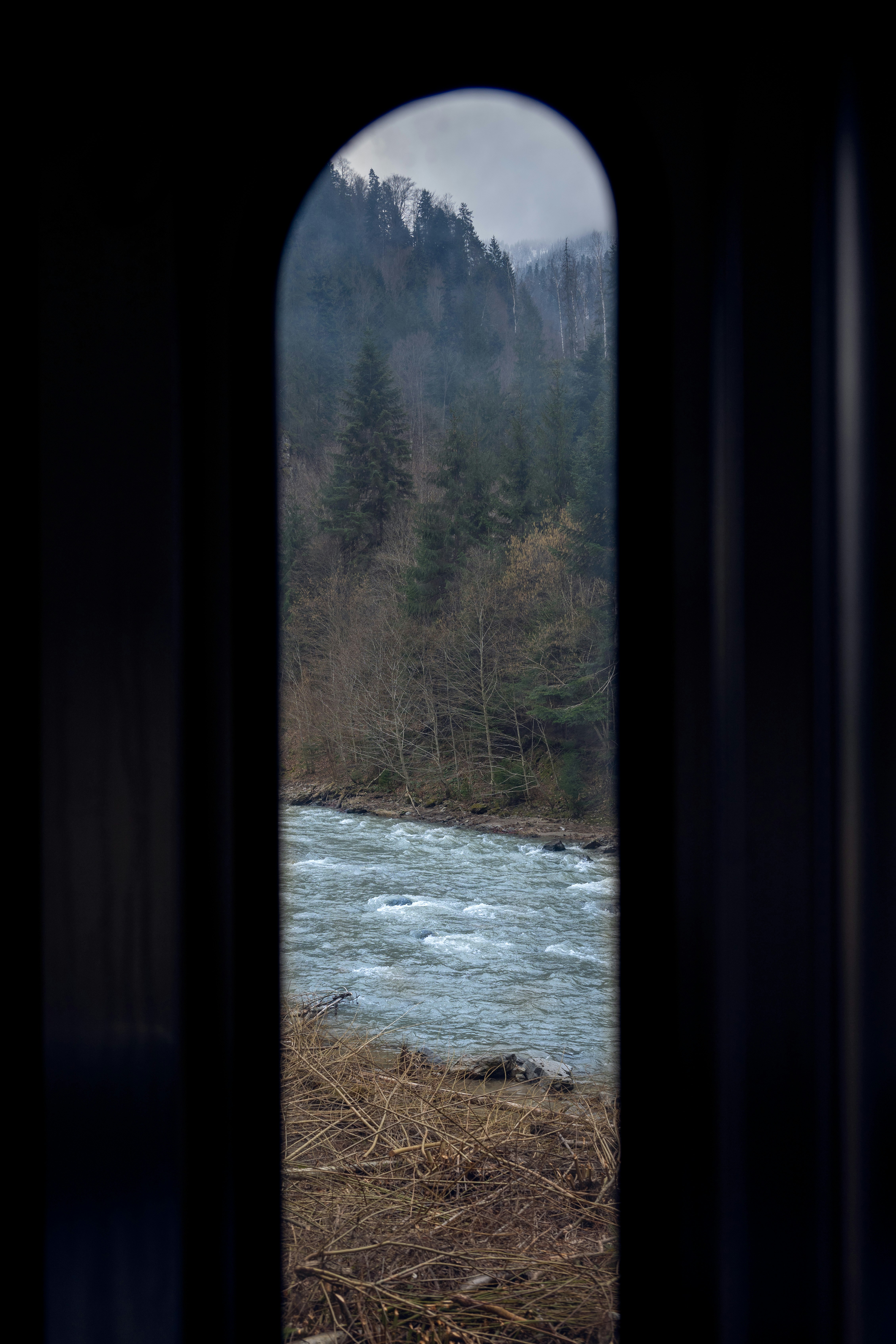a view of a river through a window