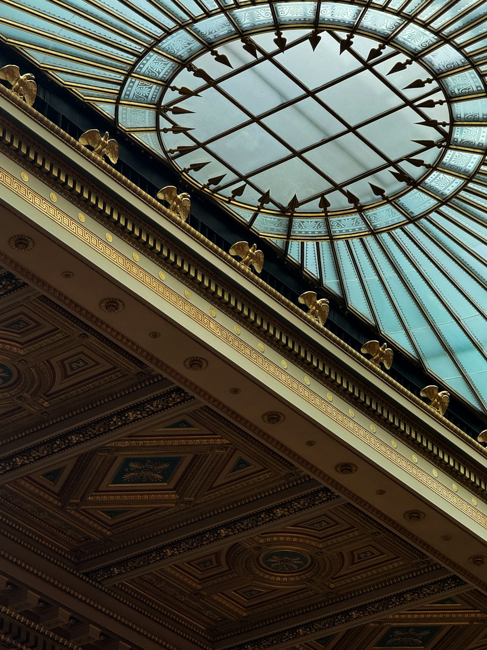 a ceiling with a glass dome above it