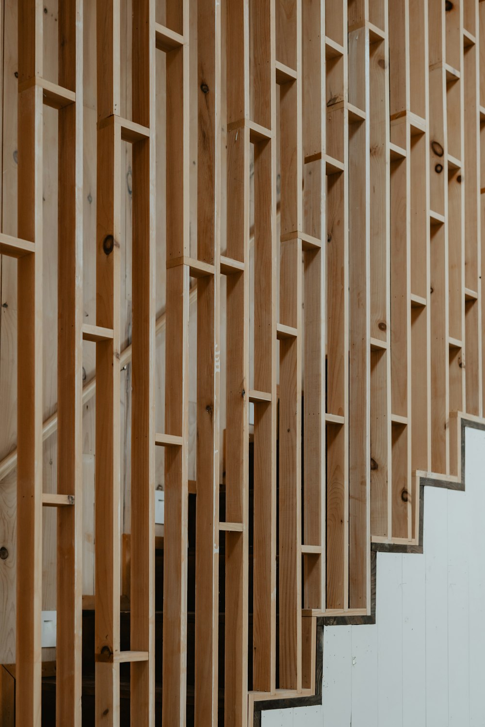 a staircase made of wooden planks in a building
