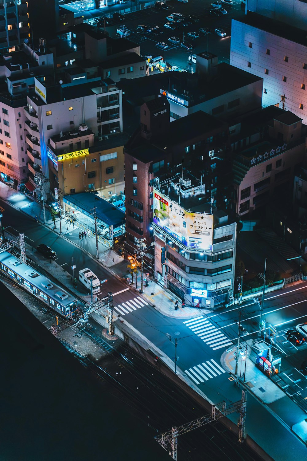 an aerial view of a city at night