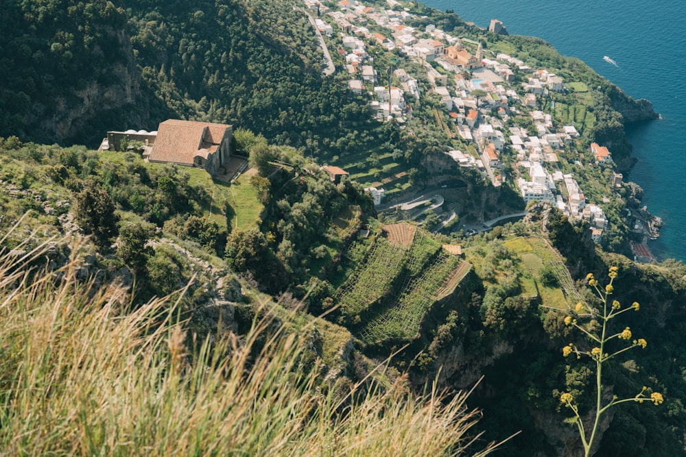 a scenic view of a town and a body of water