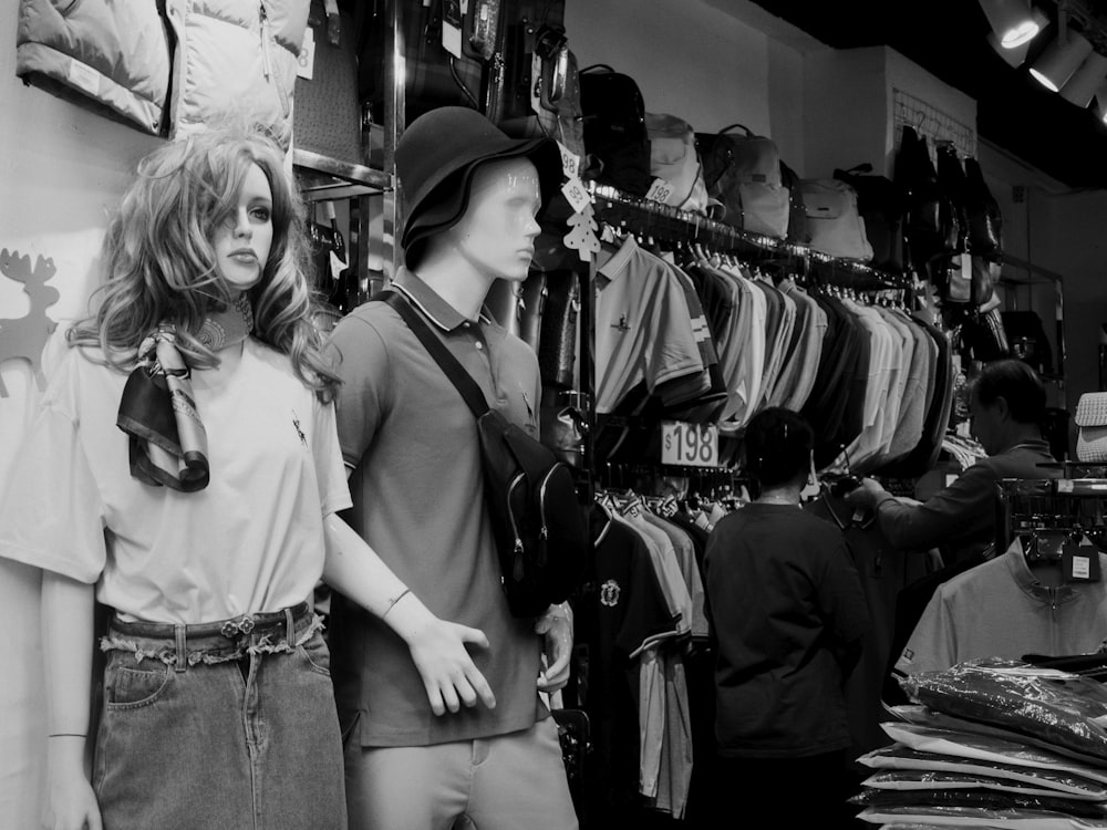 a couple of women standing next to each other in a store