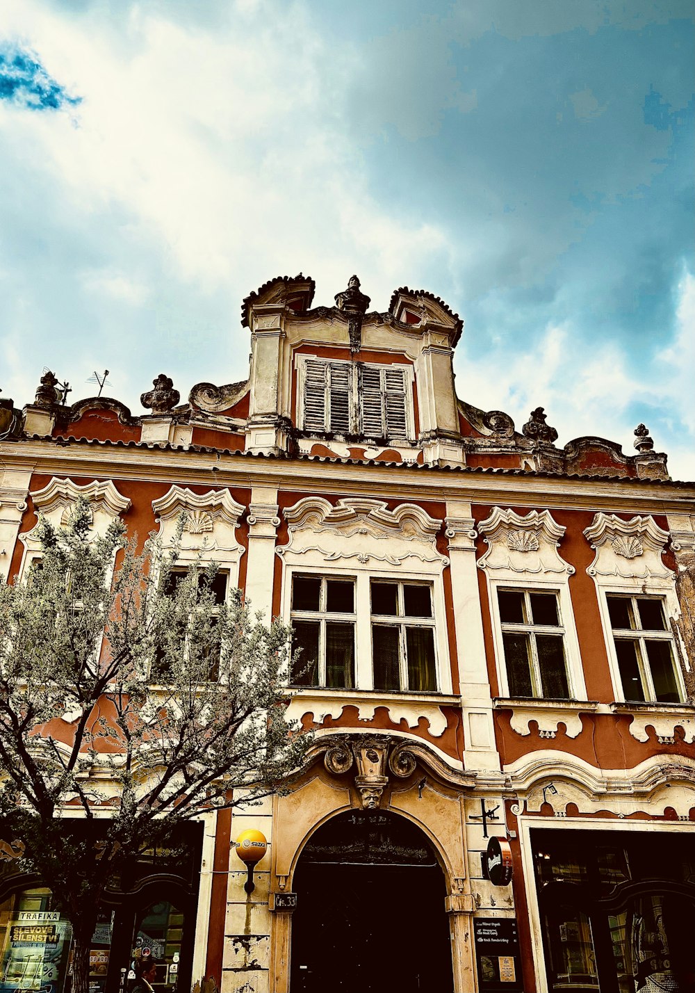 a large building with a clock on the front of it