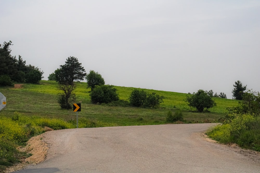 a road with a sign on the side of it