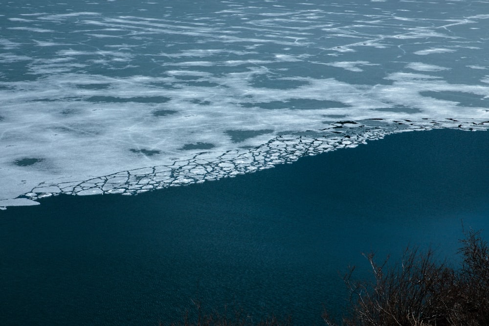 a large body of water with ice on it