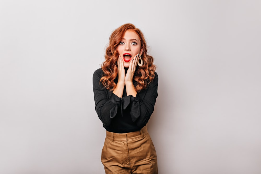 a woman with a surprised look on her face