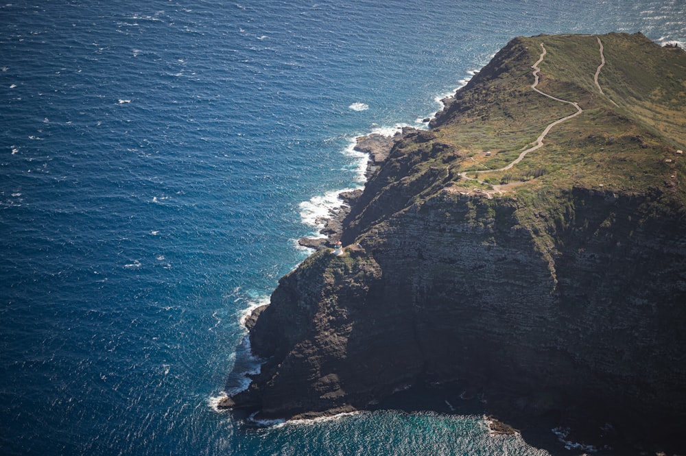 an aerial view of an island in the middle of the ocean