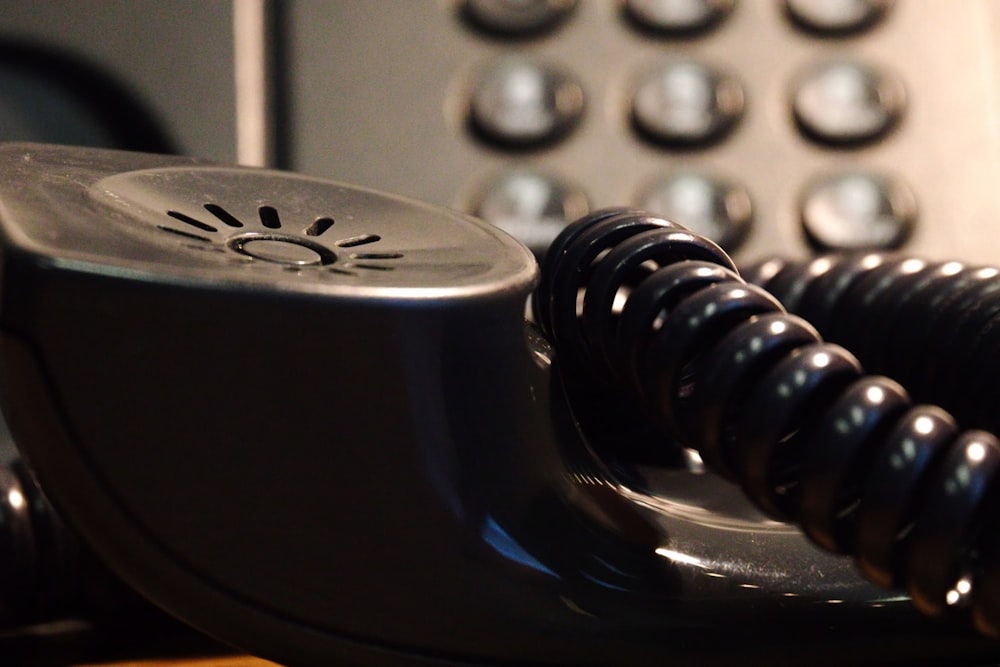 a close up of an old fashioned telephone