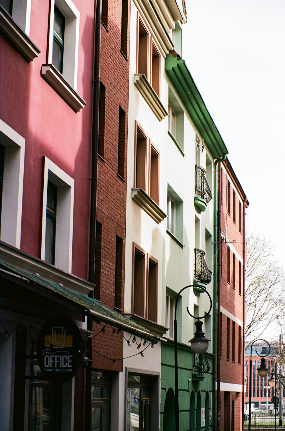 a row of buildings on a city street