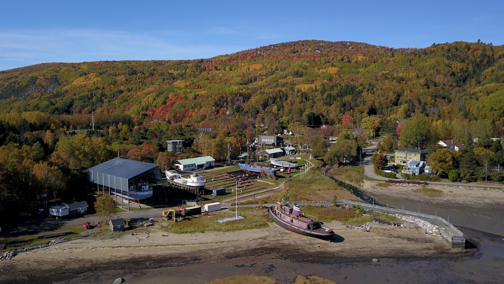 an aerial view of a small town with a river running through it