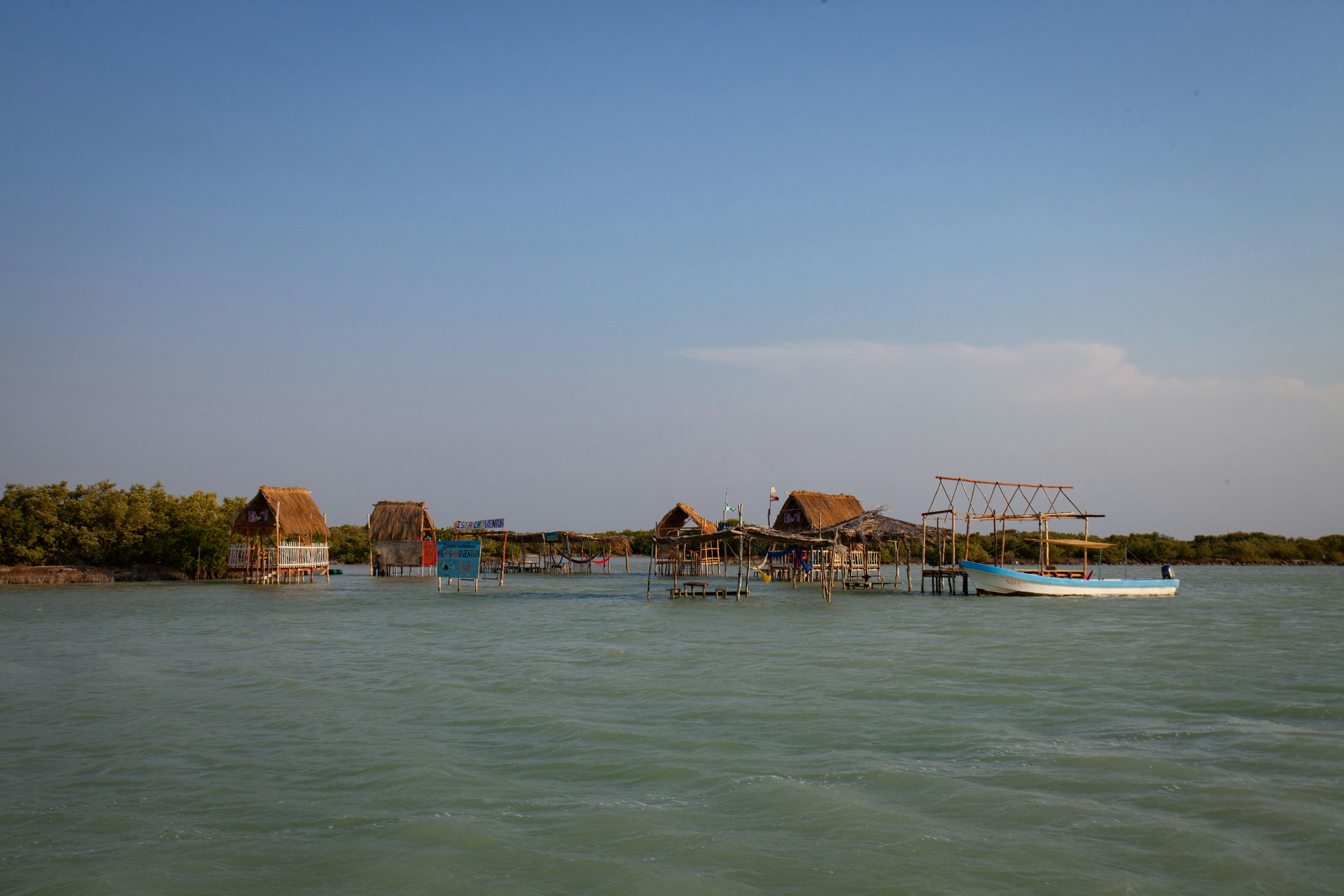 a boat floating on top of a body of water