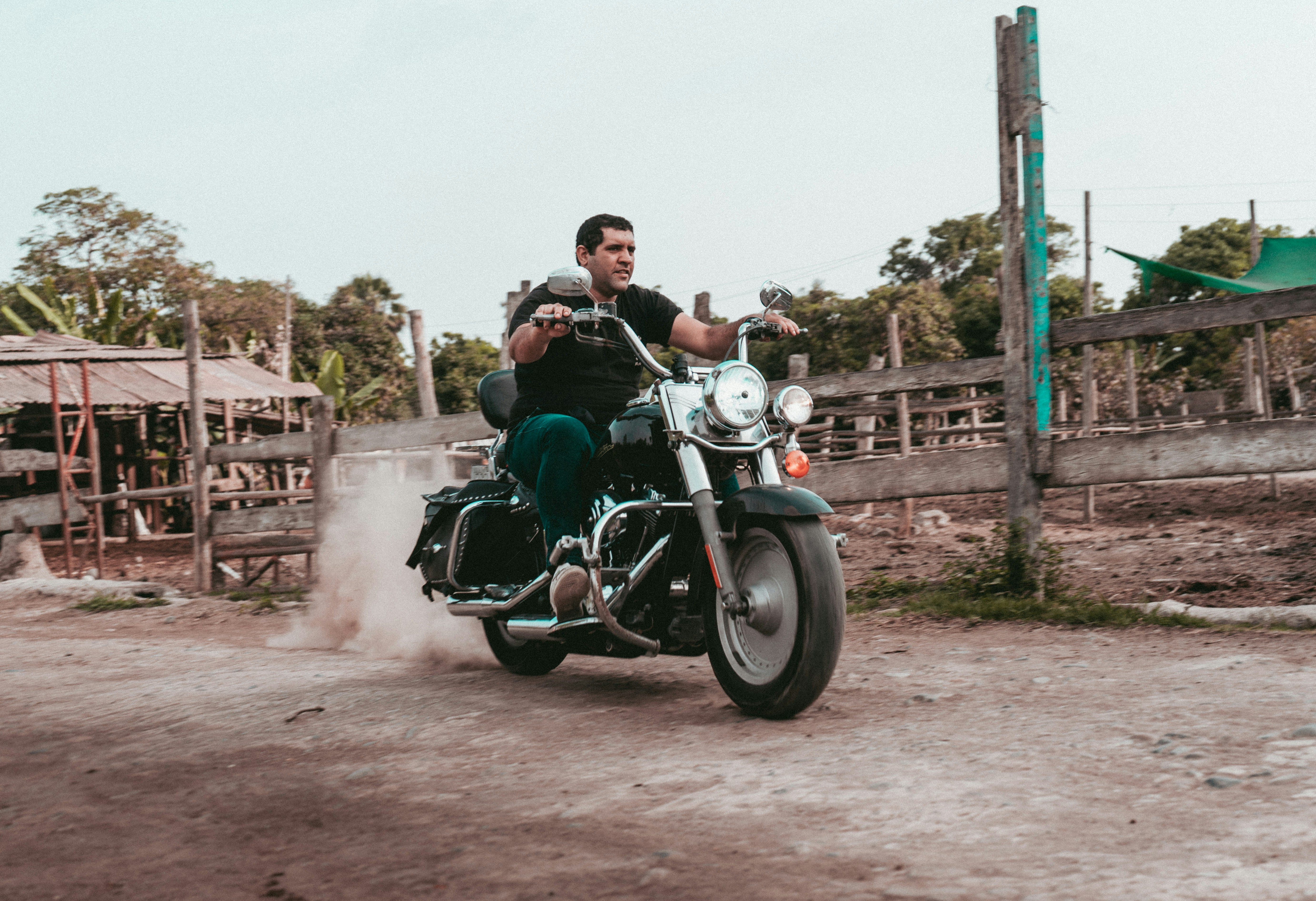 A man riding on the back of a motorcycle photo – Free Lurín Image on ...