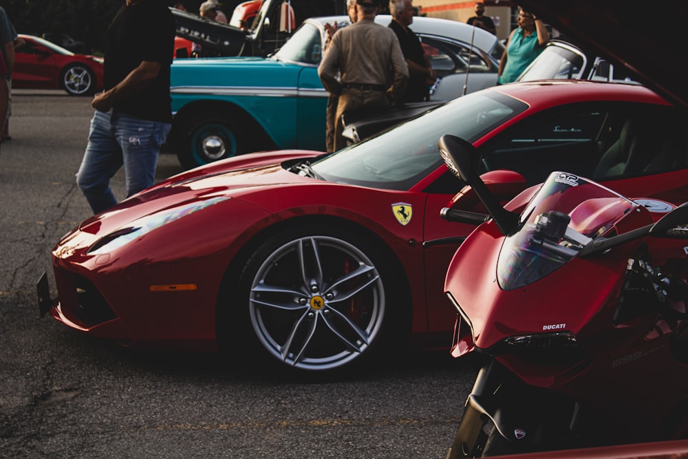 a red sports car parked in a parking lot