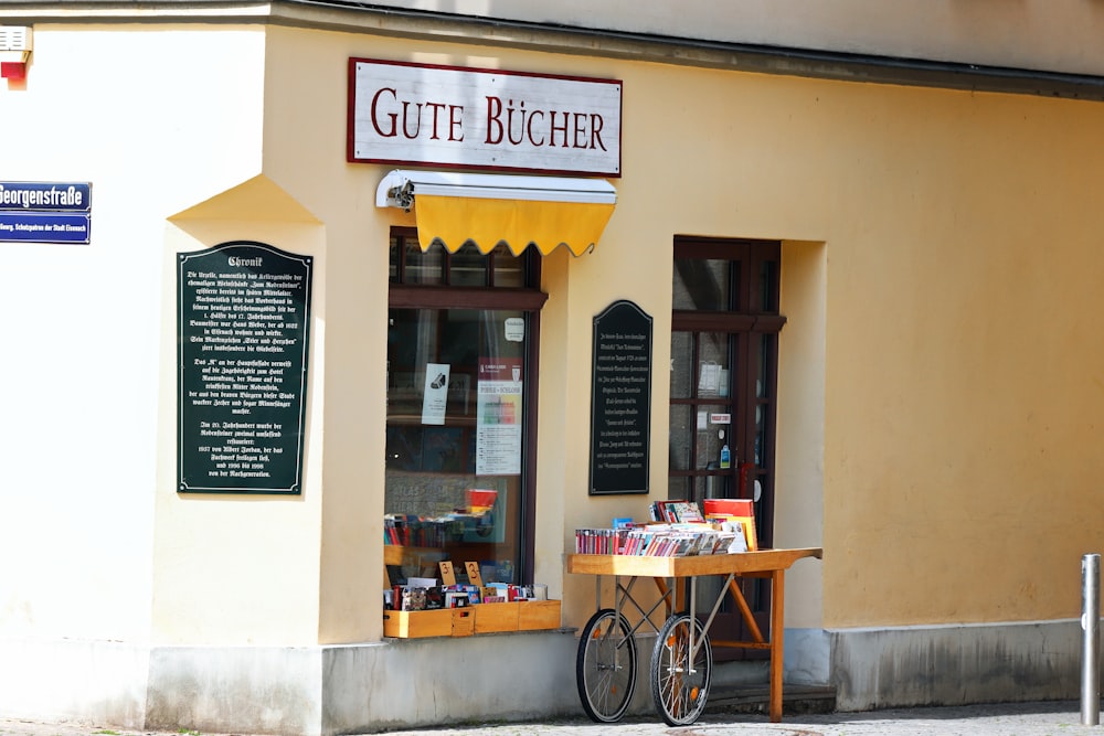 a bike parked outside of a book store