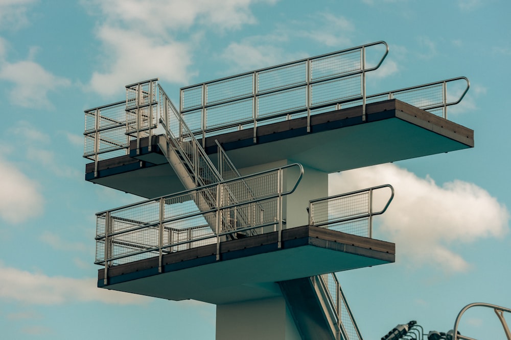 a tall metal structure with a sky background