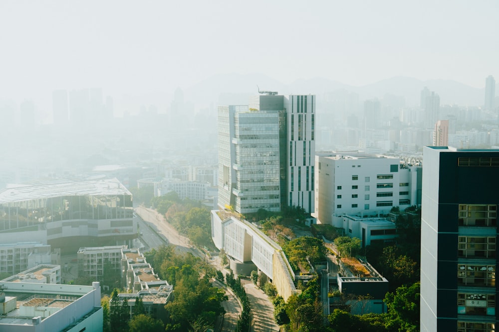 an aerial view of a city with tall buildings