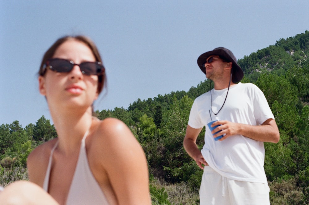 a man and a woman standing next to each other