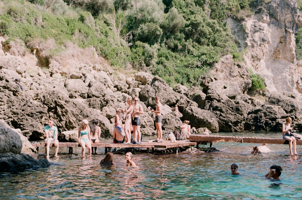 a group of people in a body of water