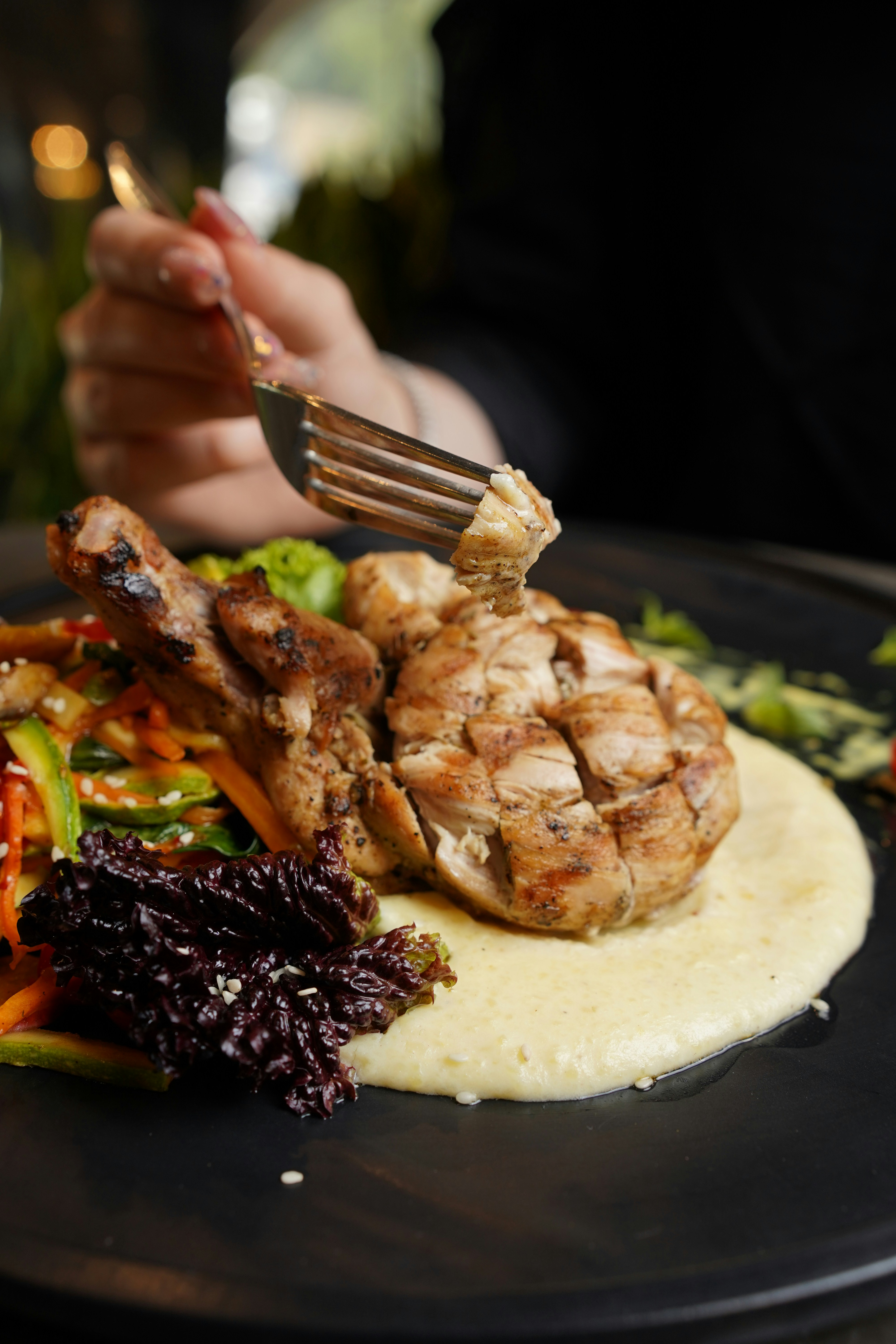 a plate of food with meat and vegetables on it