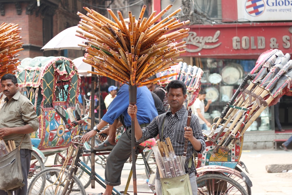 a group of people riding bikes down a street