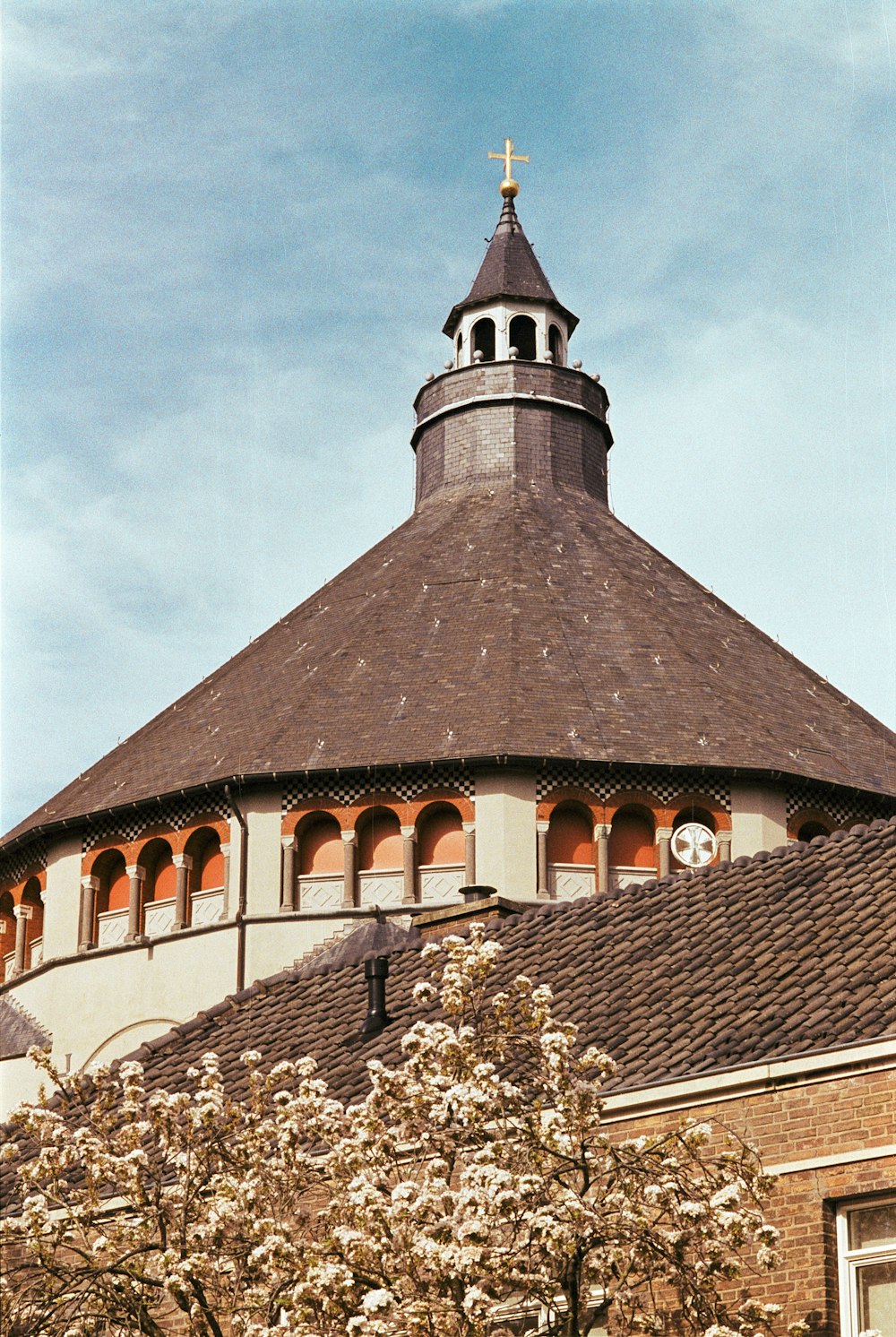 a building with a clock on the top of it