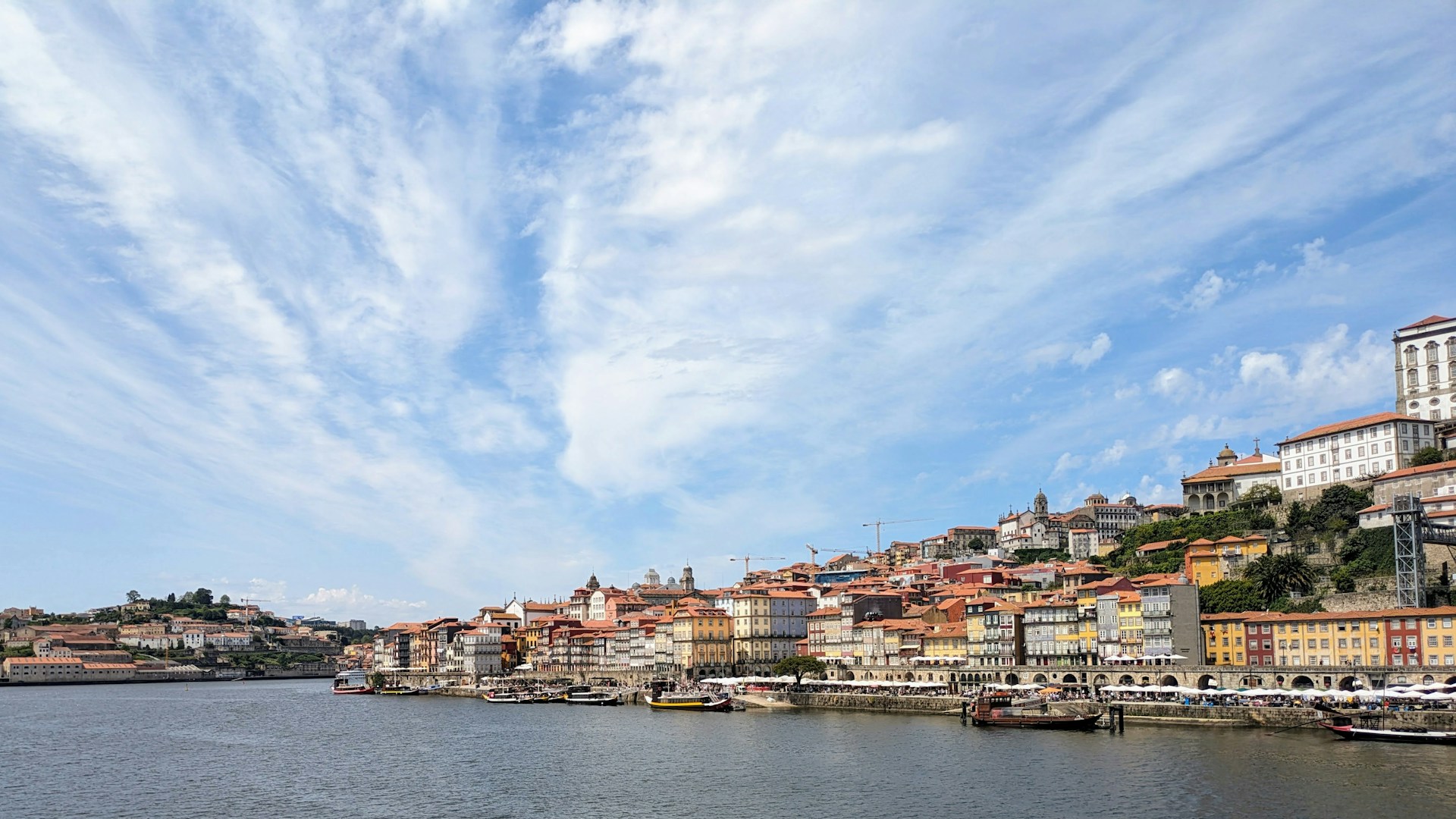 a body of water with a bunch of boats in it