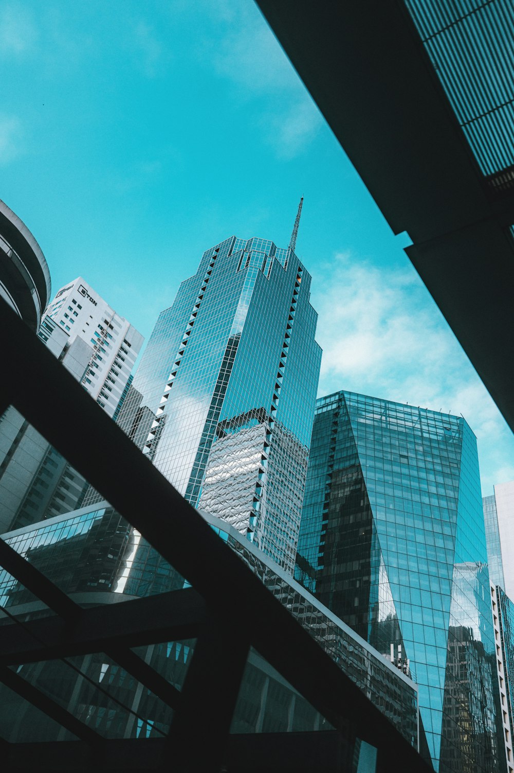 a view of some very tall buildings in the city