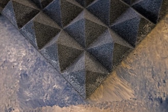 a close up of a triangle shaped object on a table