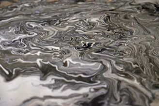 a close up of a black and white marble