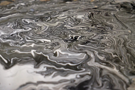 a close up of a black and white marble