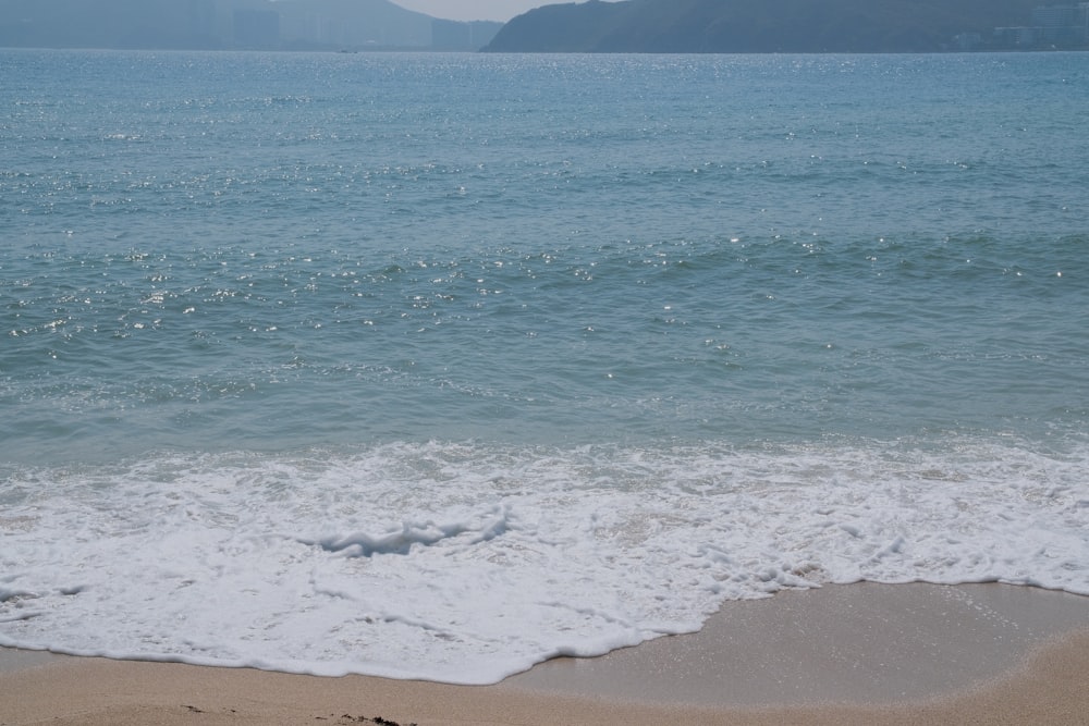 a view of a body of water from a beach