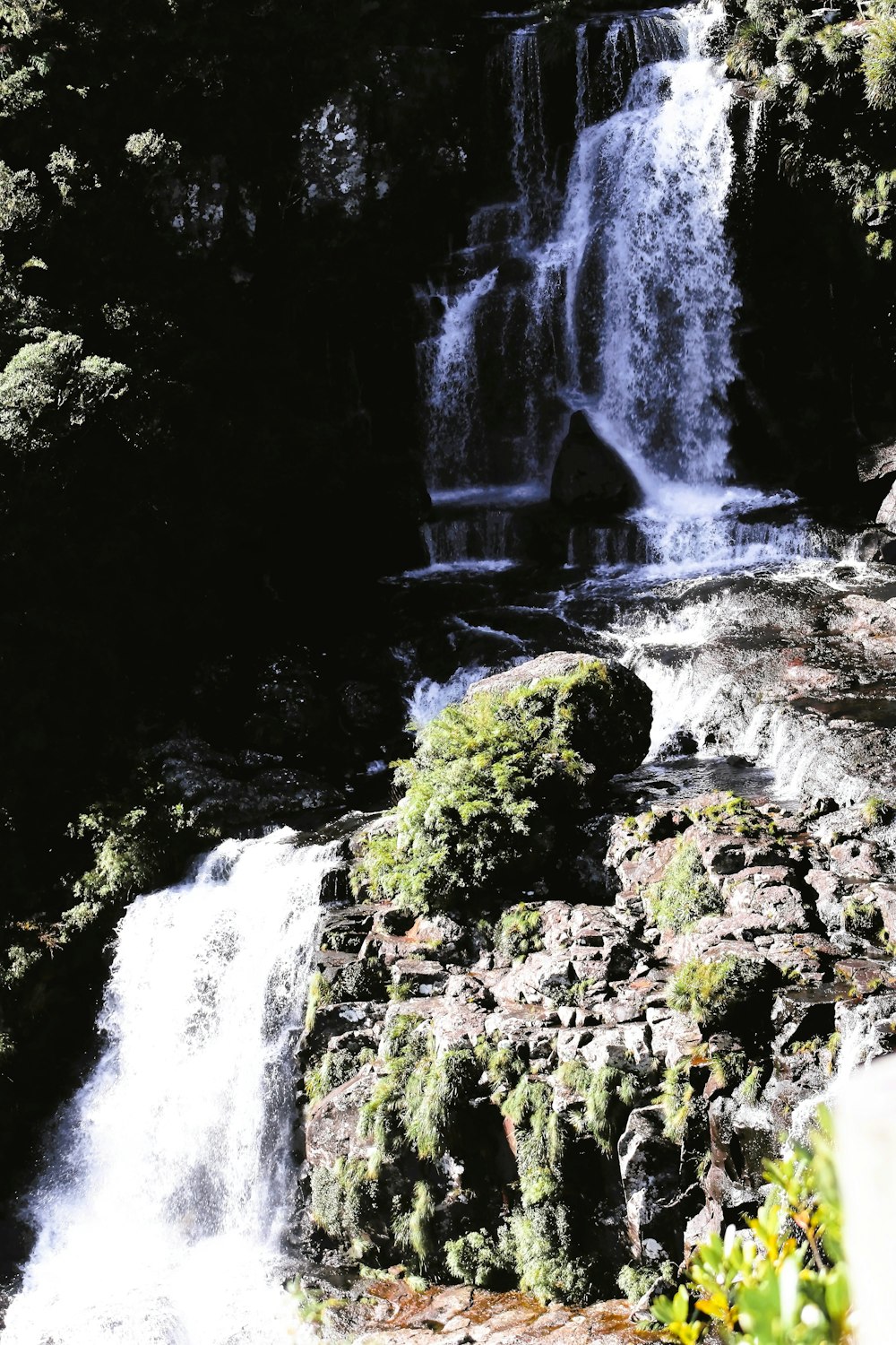 a large waterfall with lots of water coming out of it