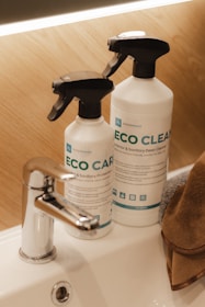 a close up of a bathroom sink with a soap dispenser